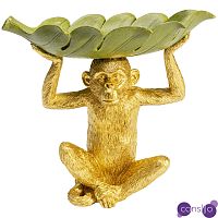 Конфетница Golden Monkey holding a leaf